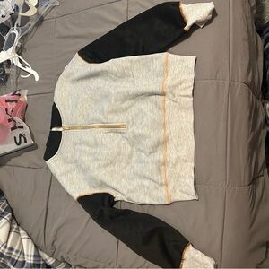 Chic Black and Gray Sweatshirt with Gold Zipper